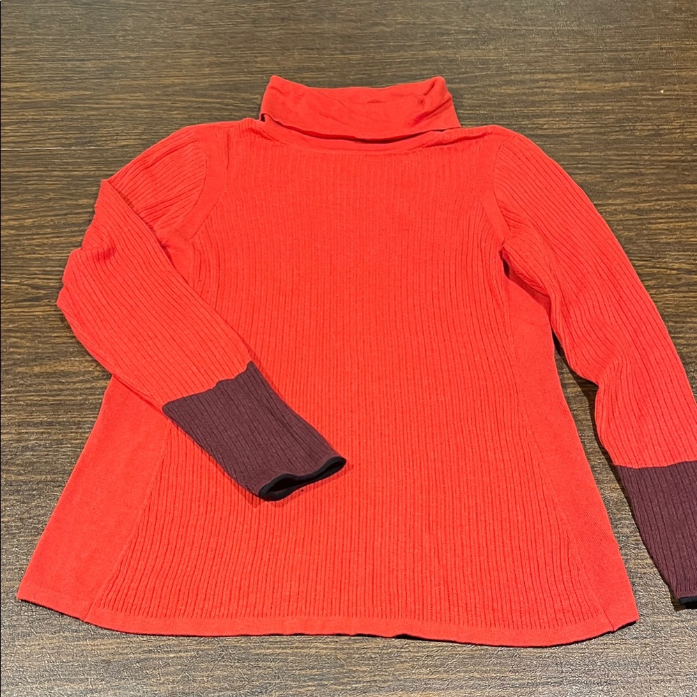 Vibrant Orange Turtleneck Sweater with Burgundy Accents